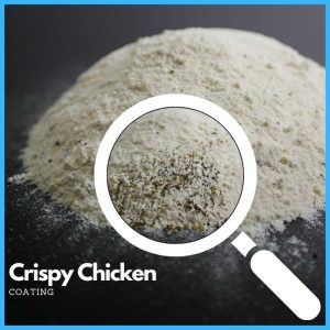Een close-up van Crispy Chicken Coating, met een knapperige textuur en een goudbruine kleur.