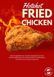 Krokante fried chicken met een pittige twist, geserveerd met frietjes en een frisse dip.